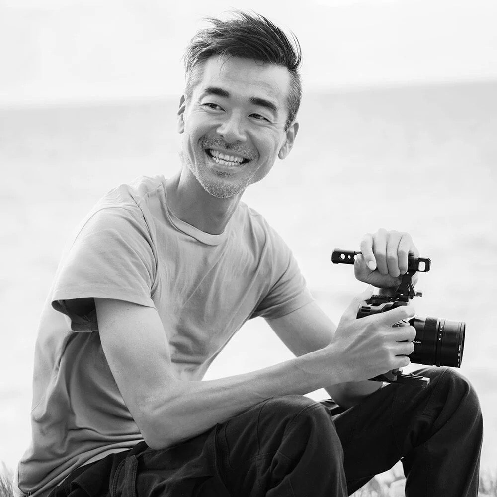 Kosuke Furukawa holding a camera