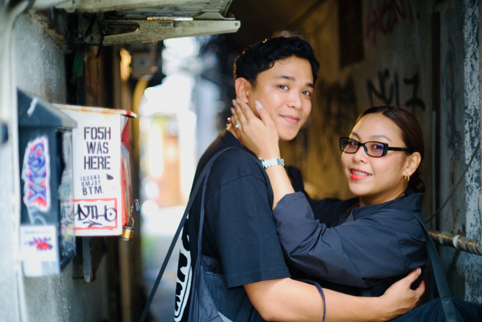 A couple in a narrow alley in Golden Gai