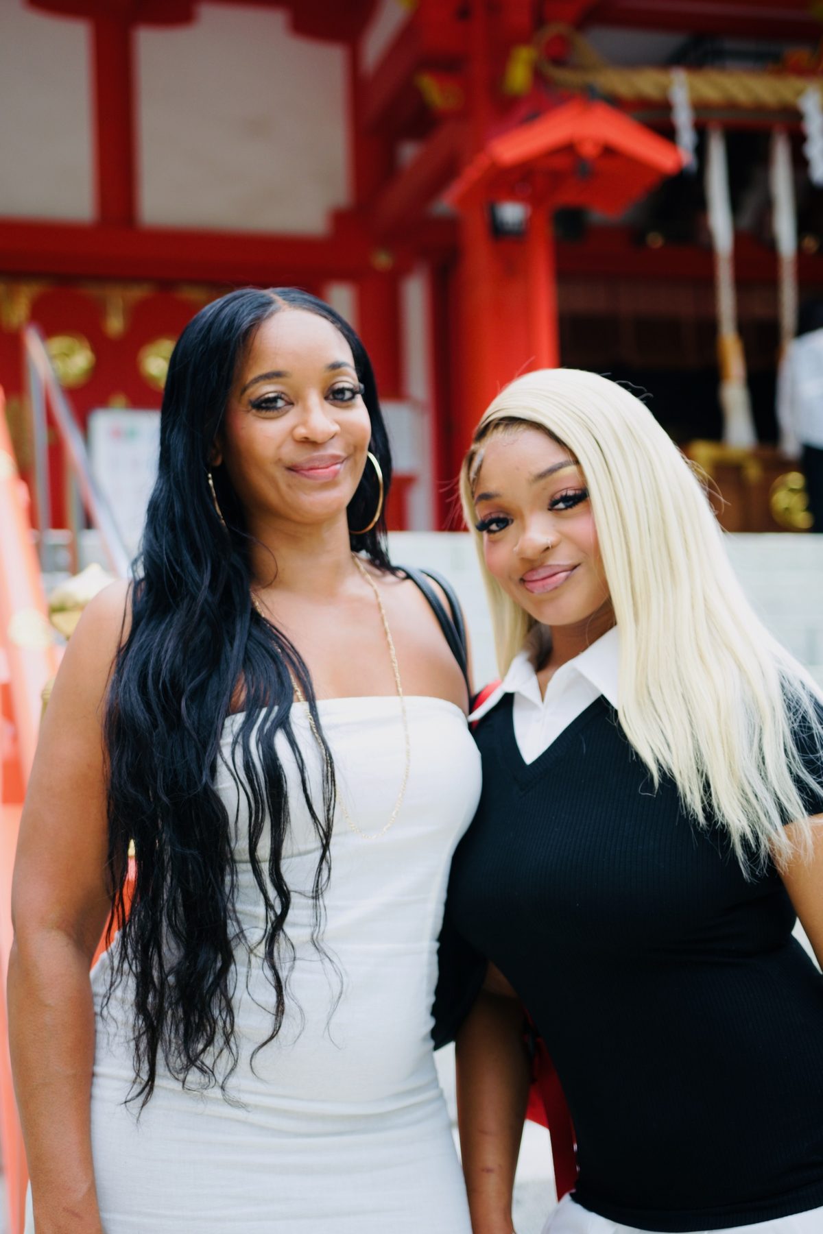 A mother and daughter at a shrine in Shinjuku